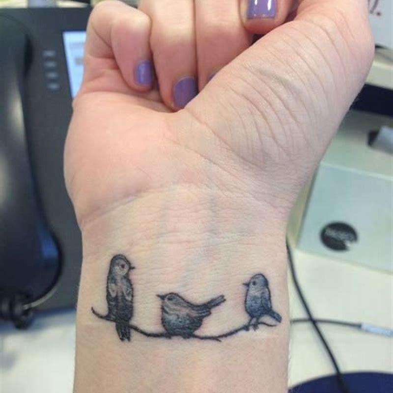 What is the meaning of small bird tattoos?