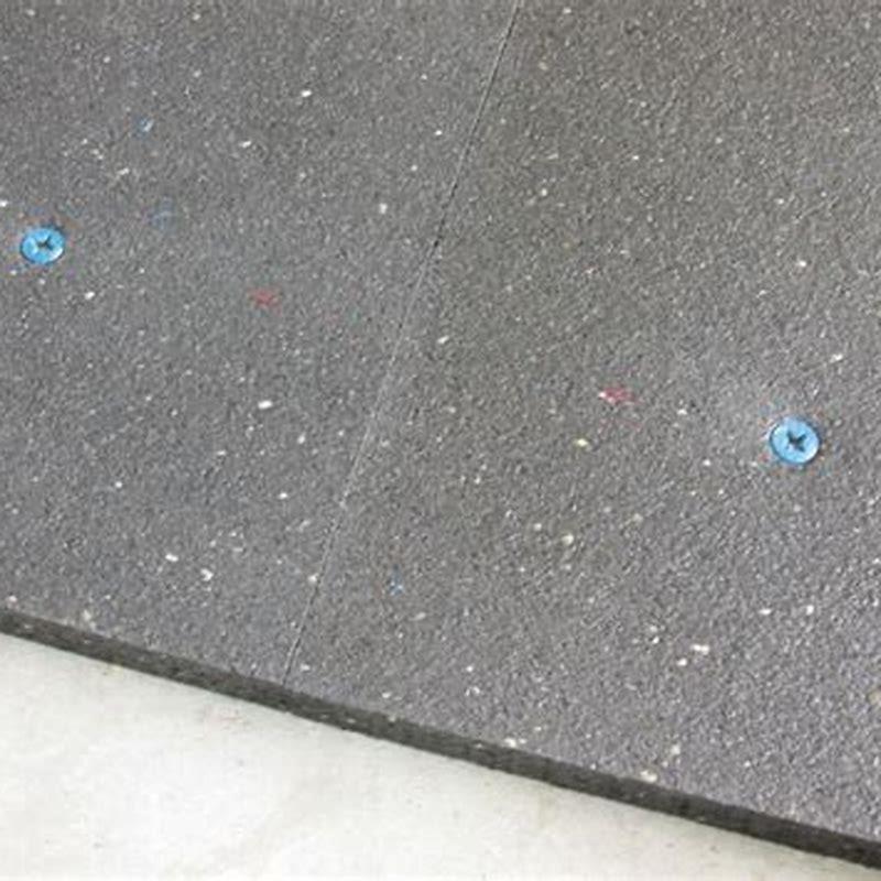 How do you anchor stall mats?
